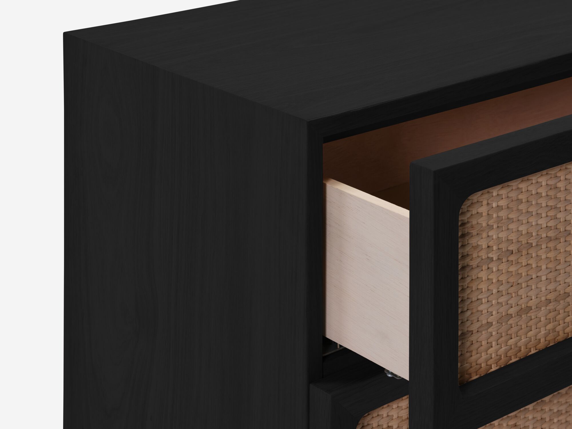 Drawer open detail view of black oak chest with woven drawer fronts